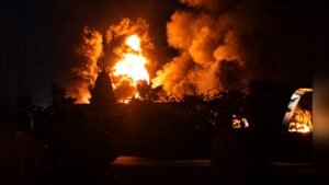 nighttime inferno behind silhouetted onlookerspng https://jaipur.visitinrajasthan.com/wp-content/uploads/2023/10/cropped-cropped-R-2.png